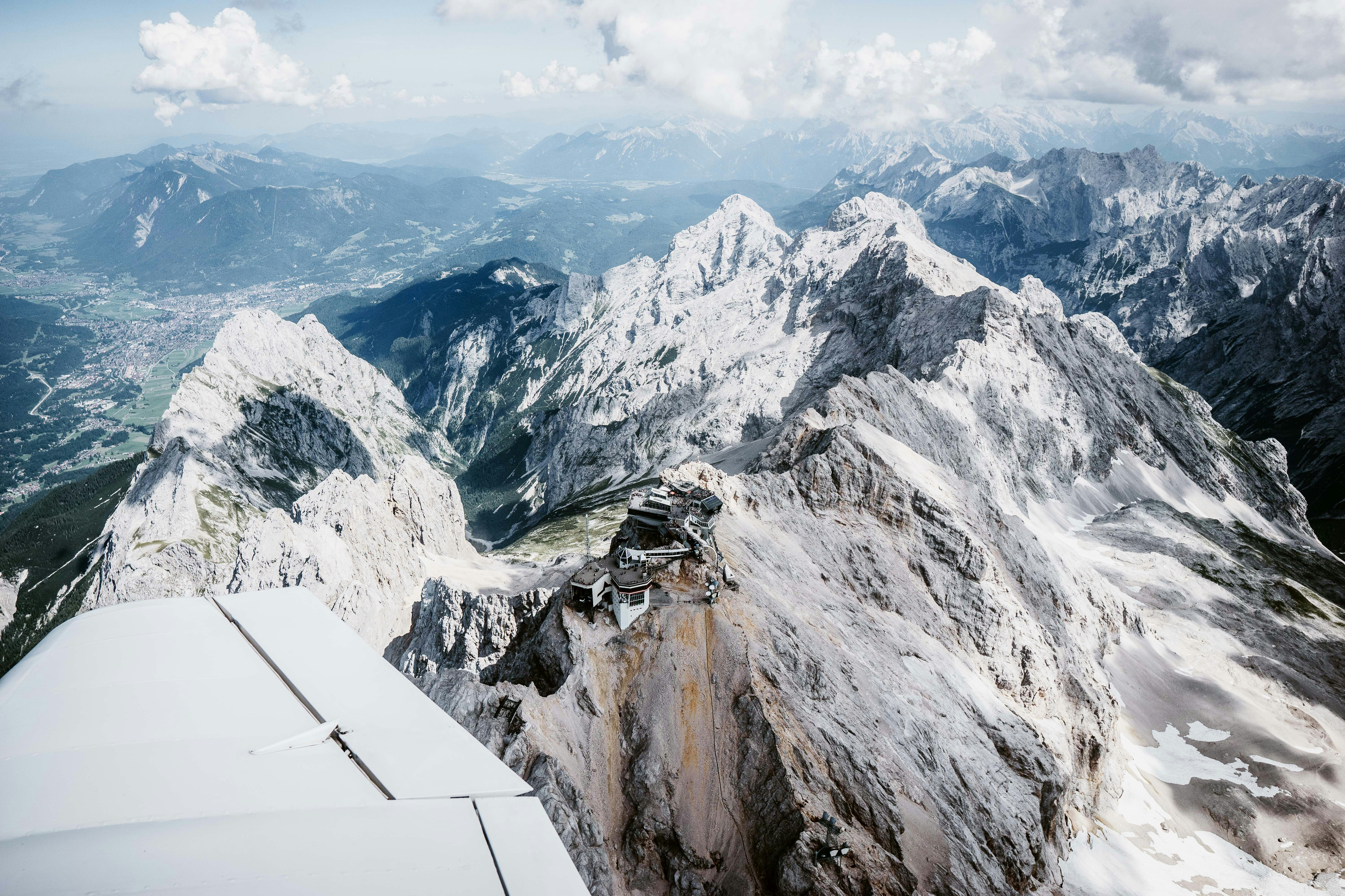 snow covered mountain during daytime